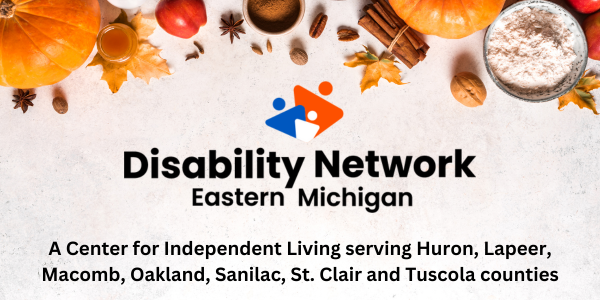 Below pumpkins leaves nuts and other autumn foods is the Disability Network Eastern Michigan logo. The text says a Center for Independent Living serving Huron Lapeer Macomb Oakland Sanilac St. Clair and Tuscola counties.