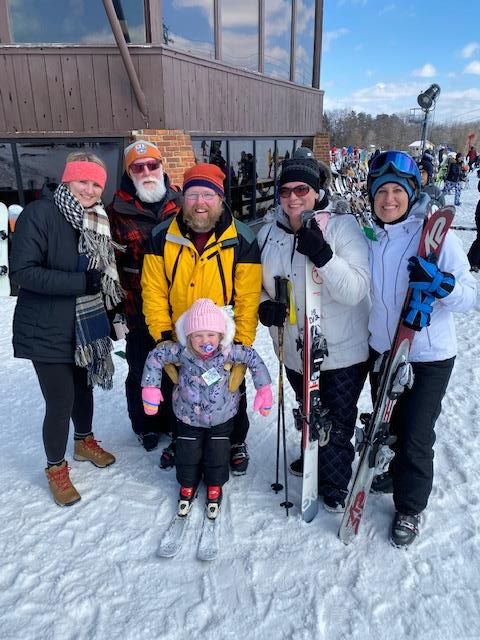 Disability Network Eastern Michigan staff and family at an adaptive skiing event.