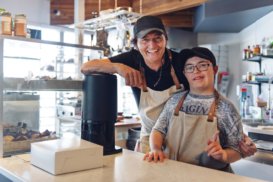 People with disabilities working at a cafe.
