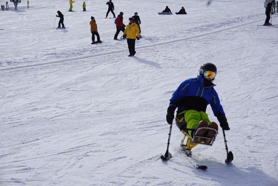 Person adaptive skiing.