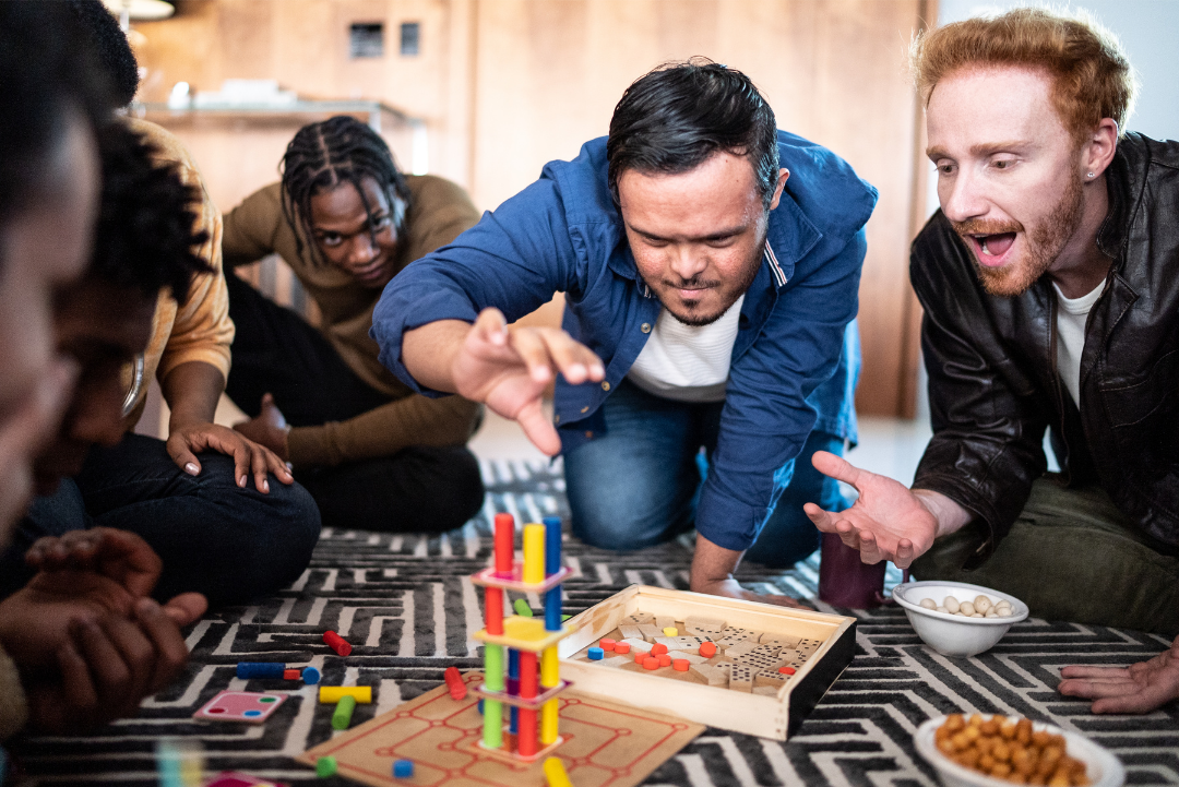 A group of people having fun playing a board game.
