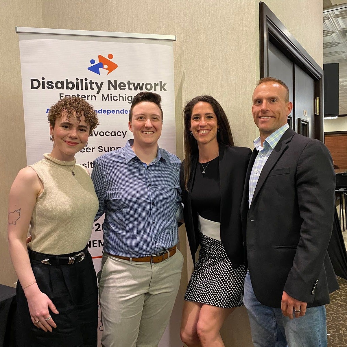 Four staff from Matrix Health and Fitness, an Art from the Heart 2025 sponsor, pose for a photo at the event.