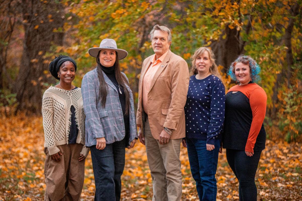 Photo taken of SMAC staff outside in front of fall leaves