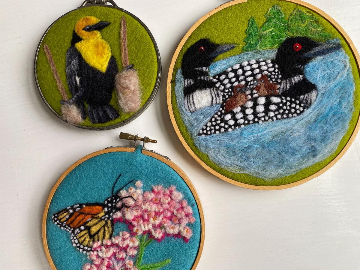 Needle felted loons, butterfly and black and yellow bird