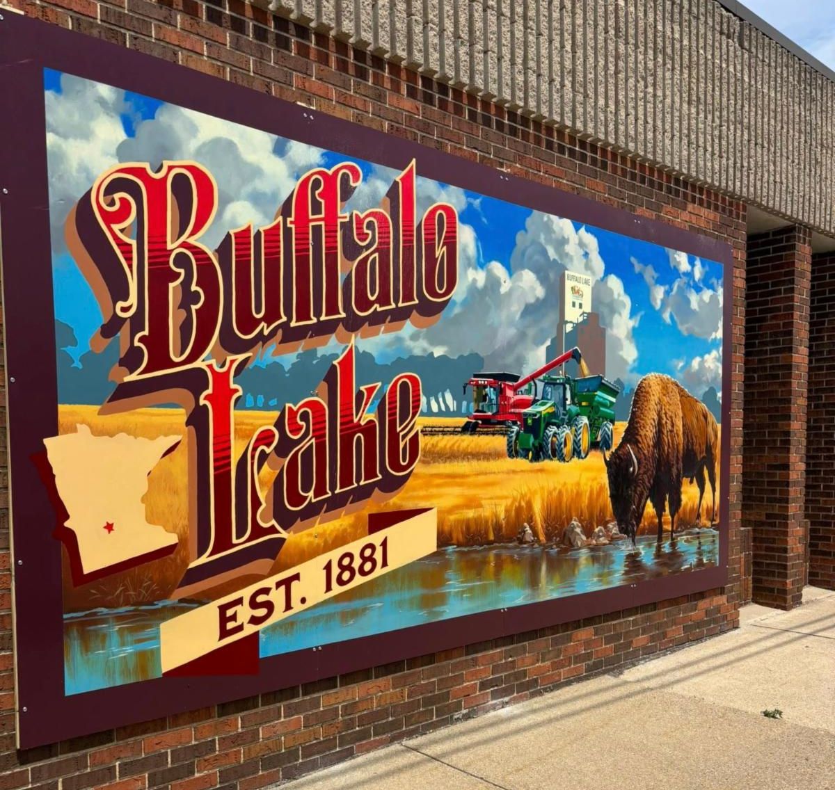 Buffalo Lake mural featuring a bison and tractors with field