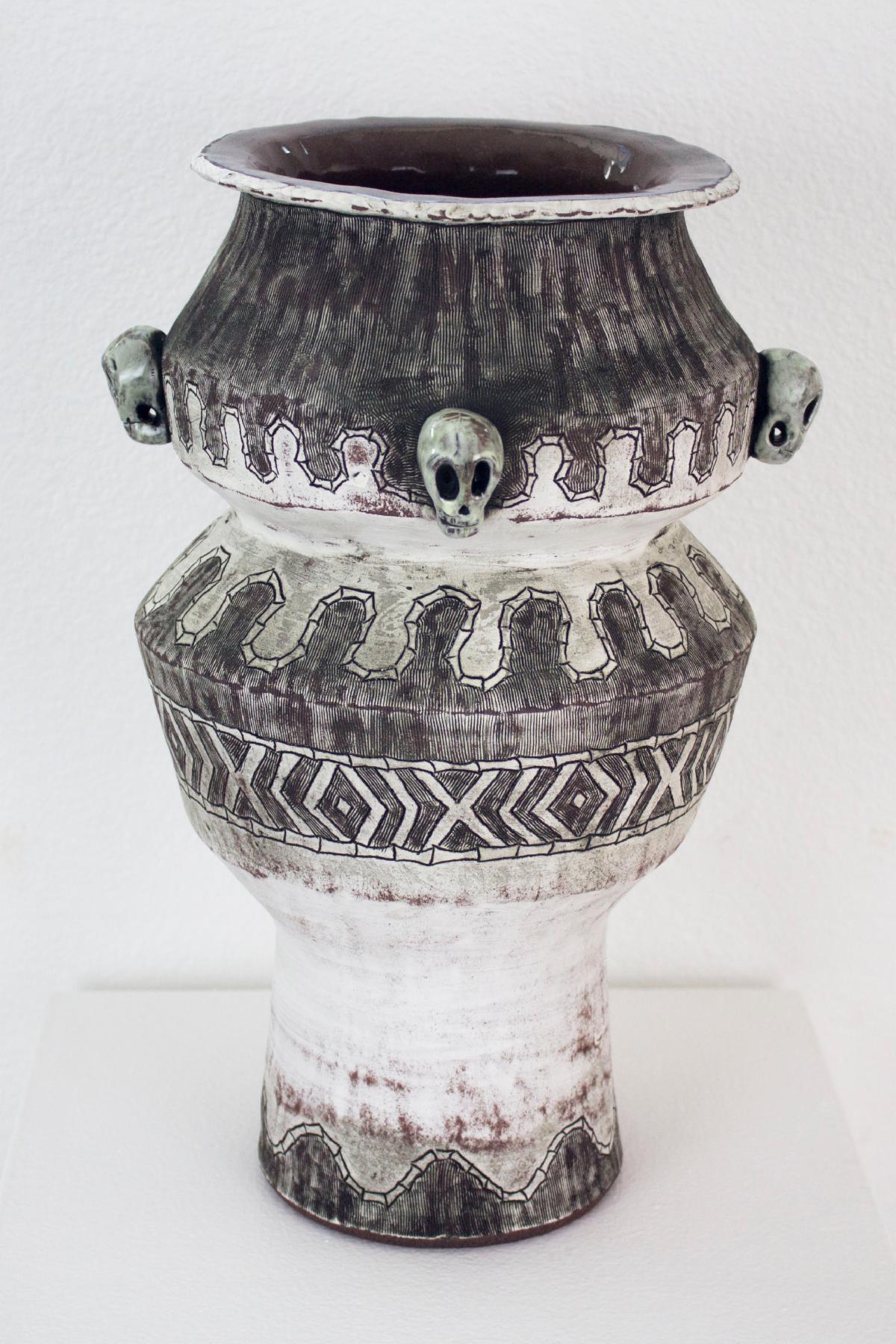 Black and white vase with skulls