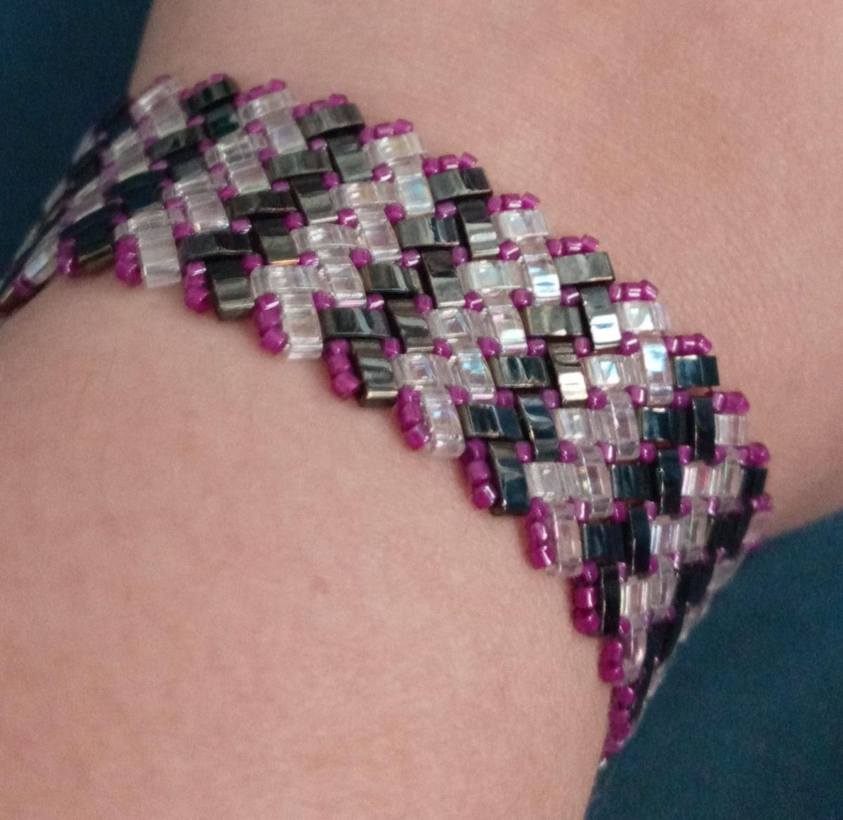 Black, purple and clear beaded bracelet