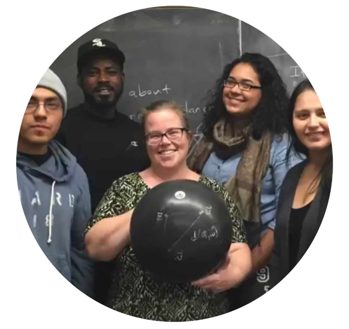 Headshot of Sormani with students and math ball