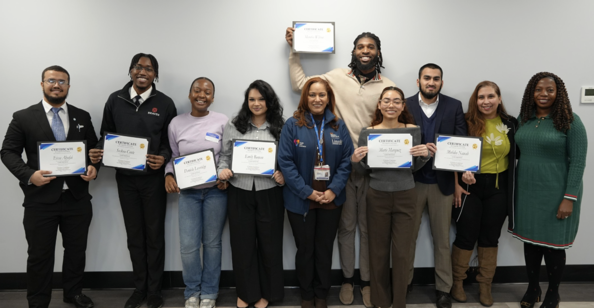 Group of students with certificates