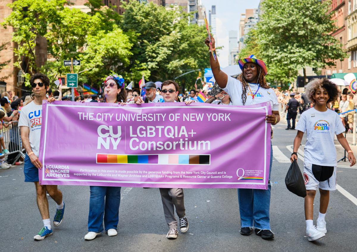 CUNY Team Members Carry Lilac Banner