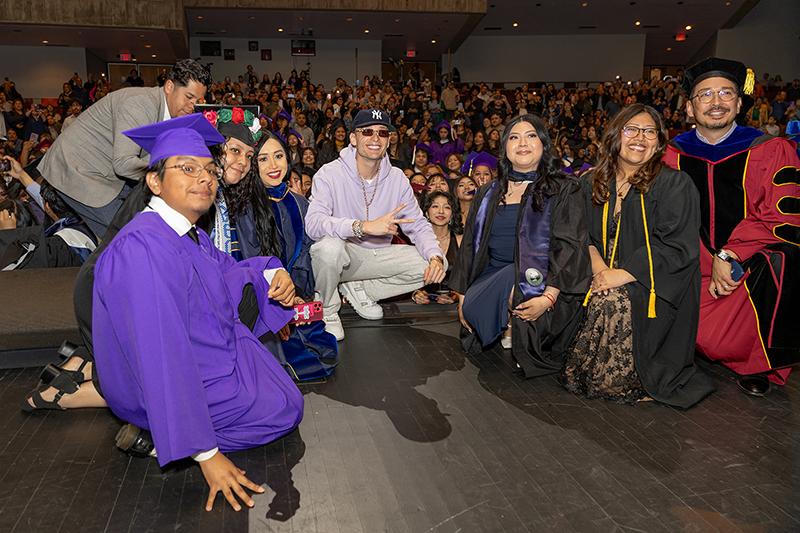 Graduates on the stage at MSI event
