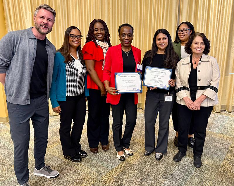 Administrative staff group photo with certificate awards