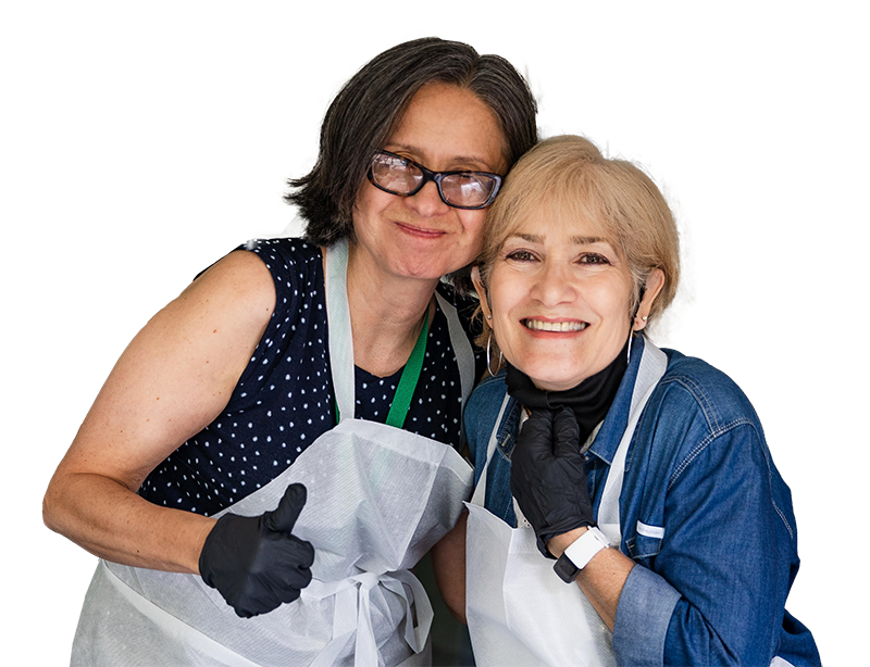 Employees wearing aprons with thumbs up sign