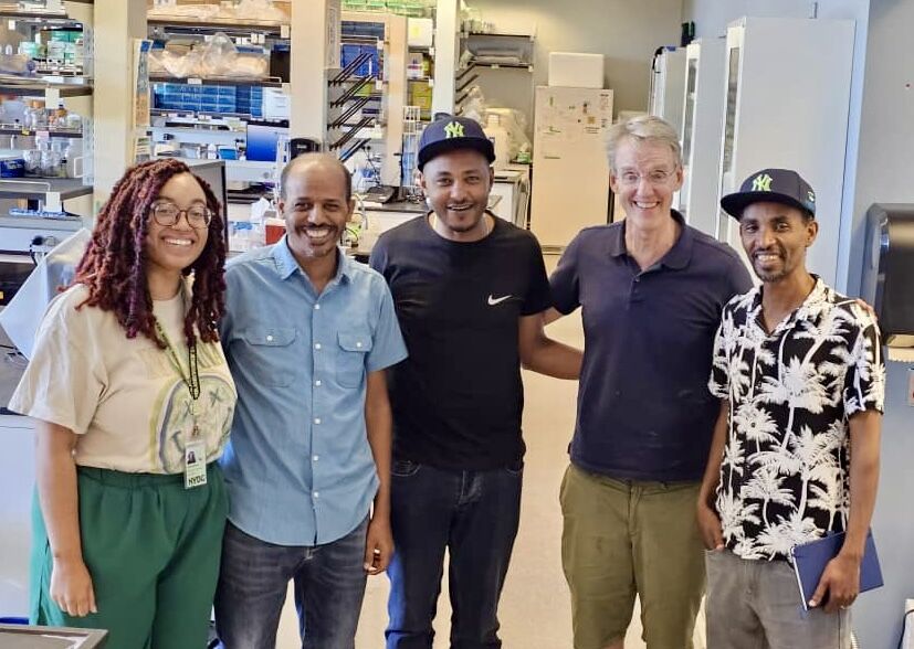 Smiling Group Photo in Lab
