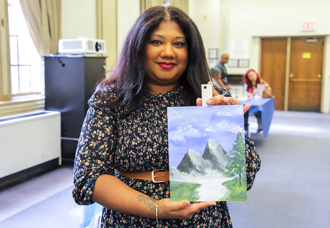Christine Sohan shares her peaceful nature scene at a faculty and staff paint and sip
