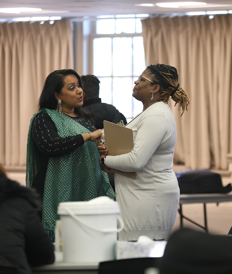 Attendees talking with each other