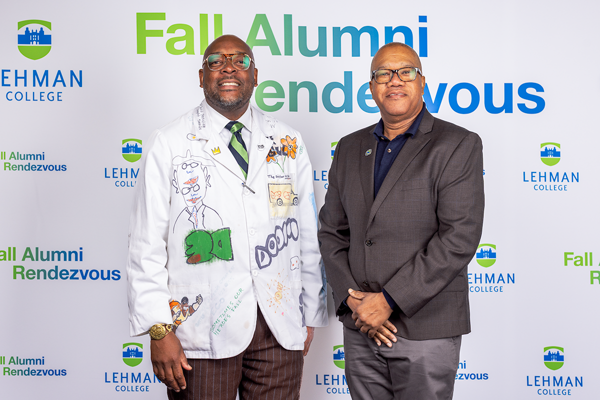 Photo of André and Interim Dean of the School of Education Wesley Pitts