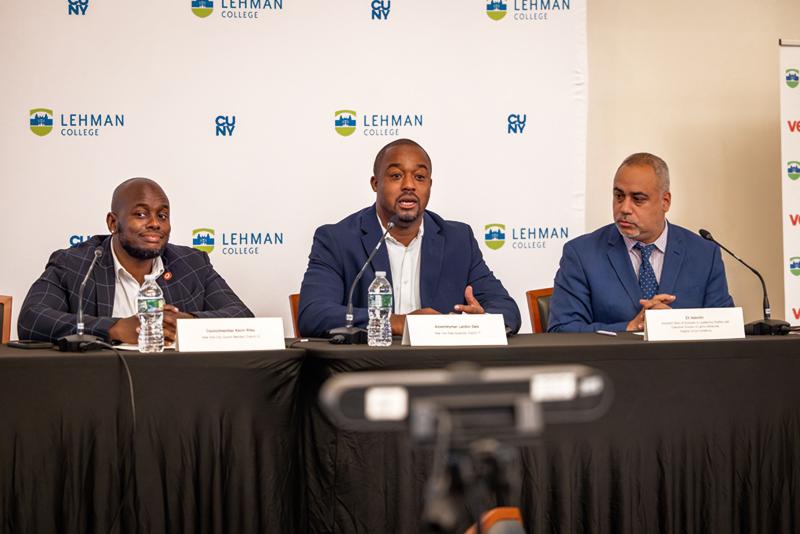 Image of three male panelist at everyday AI event on campus
