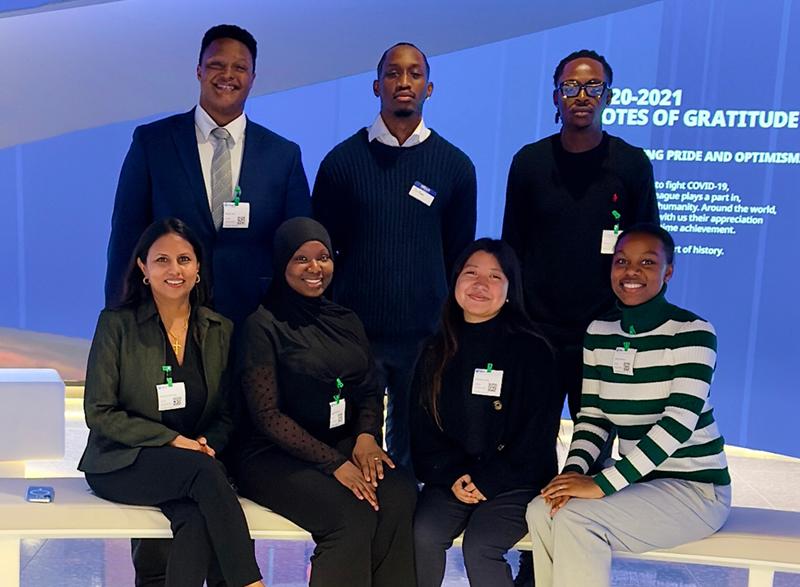 Posed Group Shot with Blue Background