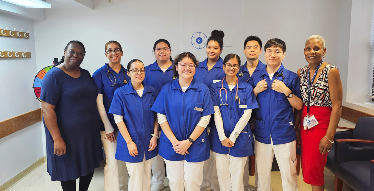 Group Photo of Dean with Nurses