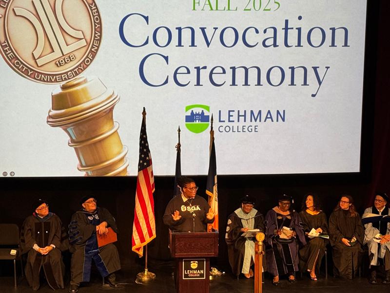 Image of Favour Agunwa Student Government Association President on stage speaking at the Convocation