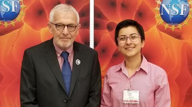 The two nobel-connected profs stand together in front of NSF Step and Repeat