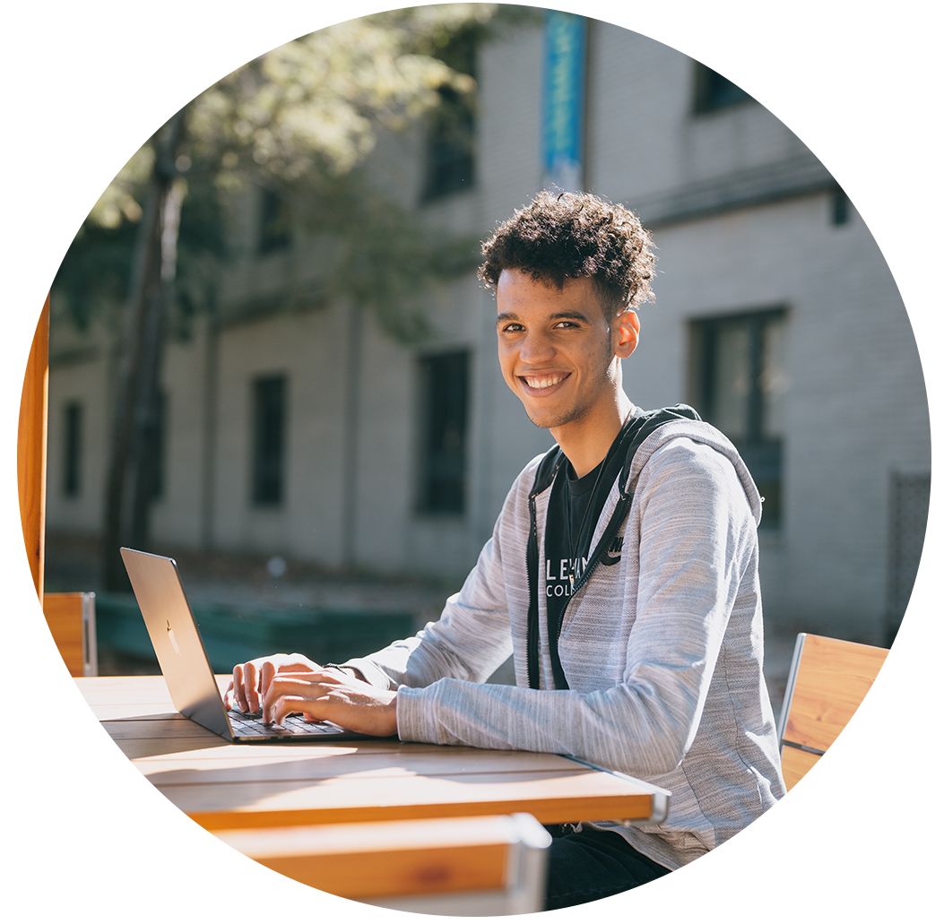 Student on campus with computer