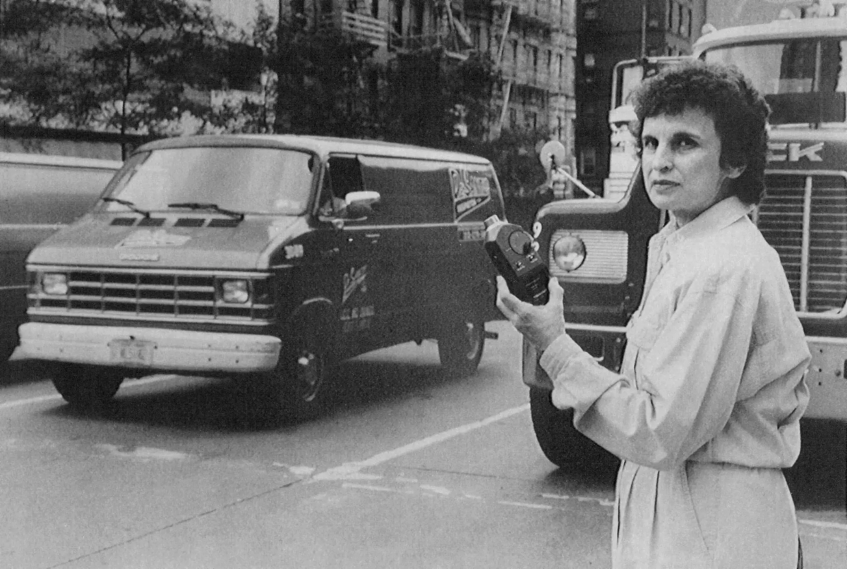 Black and White Photo of Arlene with measuring equipment