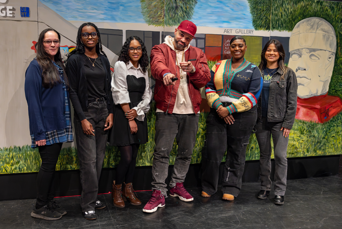 Group in front of mural