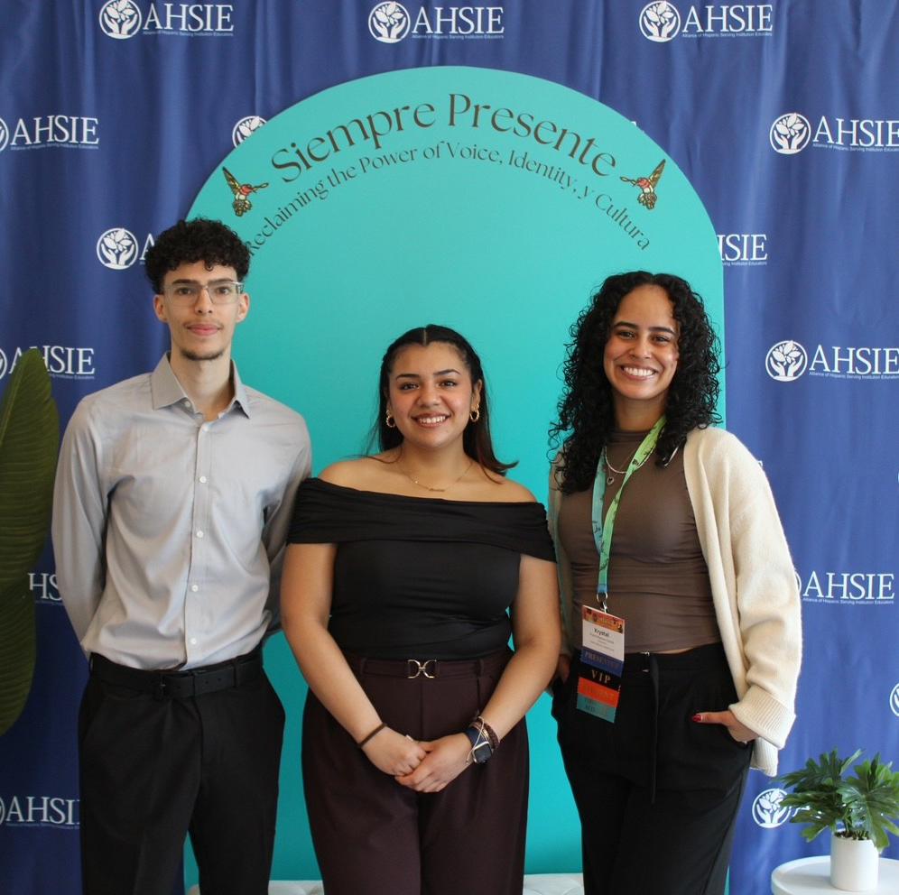 Inset of three students posing for a group shot