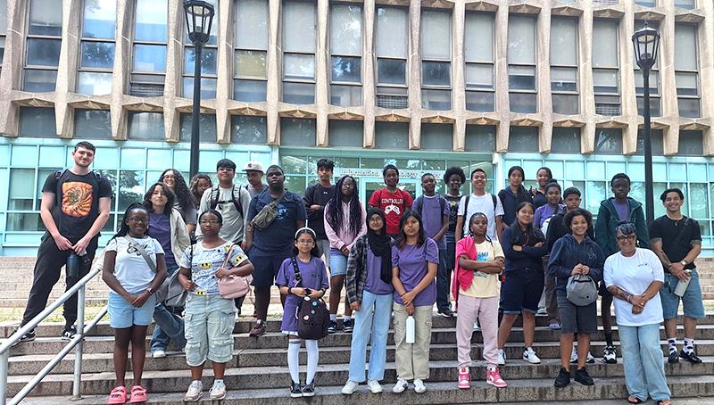 Young Students on Carman Hall steps