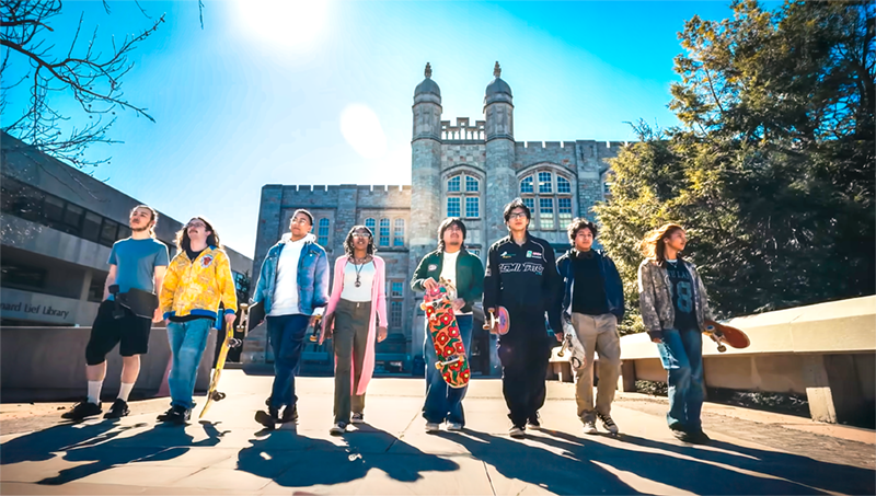 Skate Club Walks in front of Old Gym