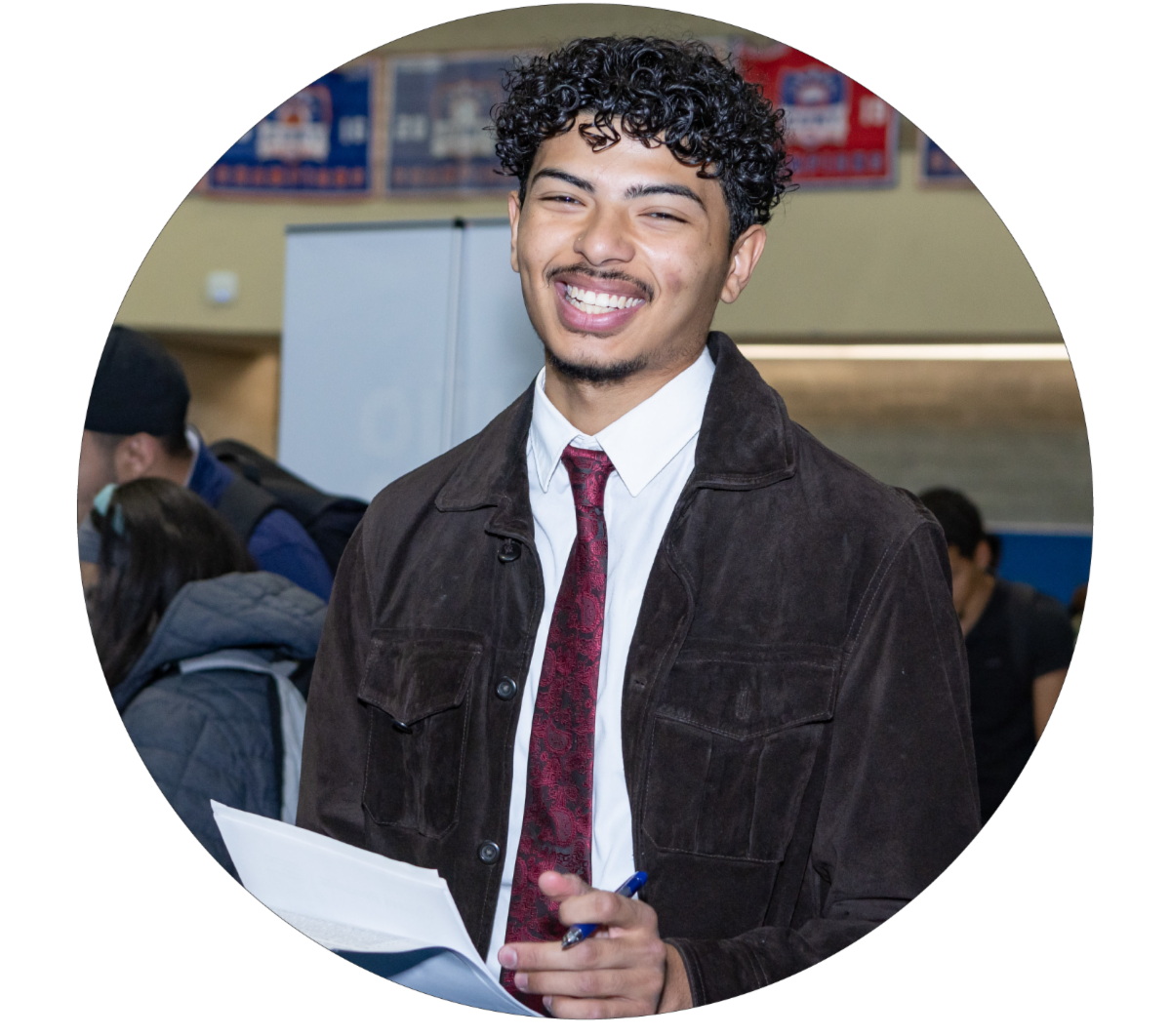 Happy young person at internship fair wearing a tie