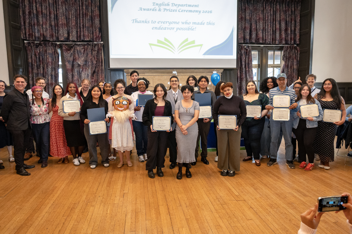 Group posing with certificates