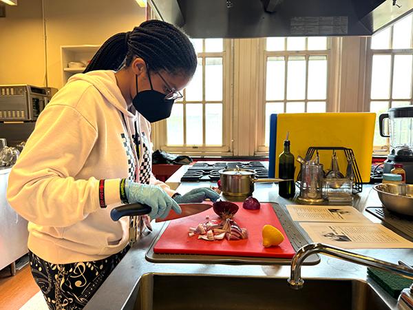 Student Prepares Food