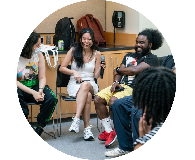 Photo of Lehman's students in a circle group talk