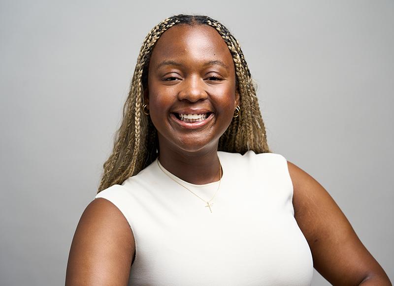 Headshot of Student with gray backdrop