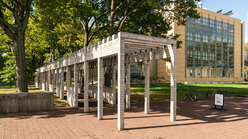 Walkway with science building in the background