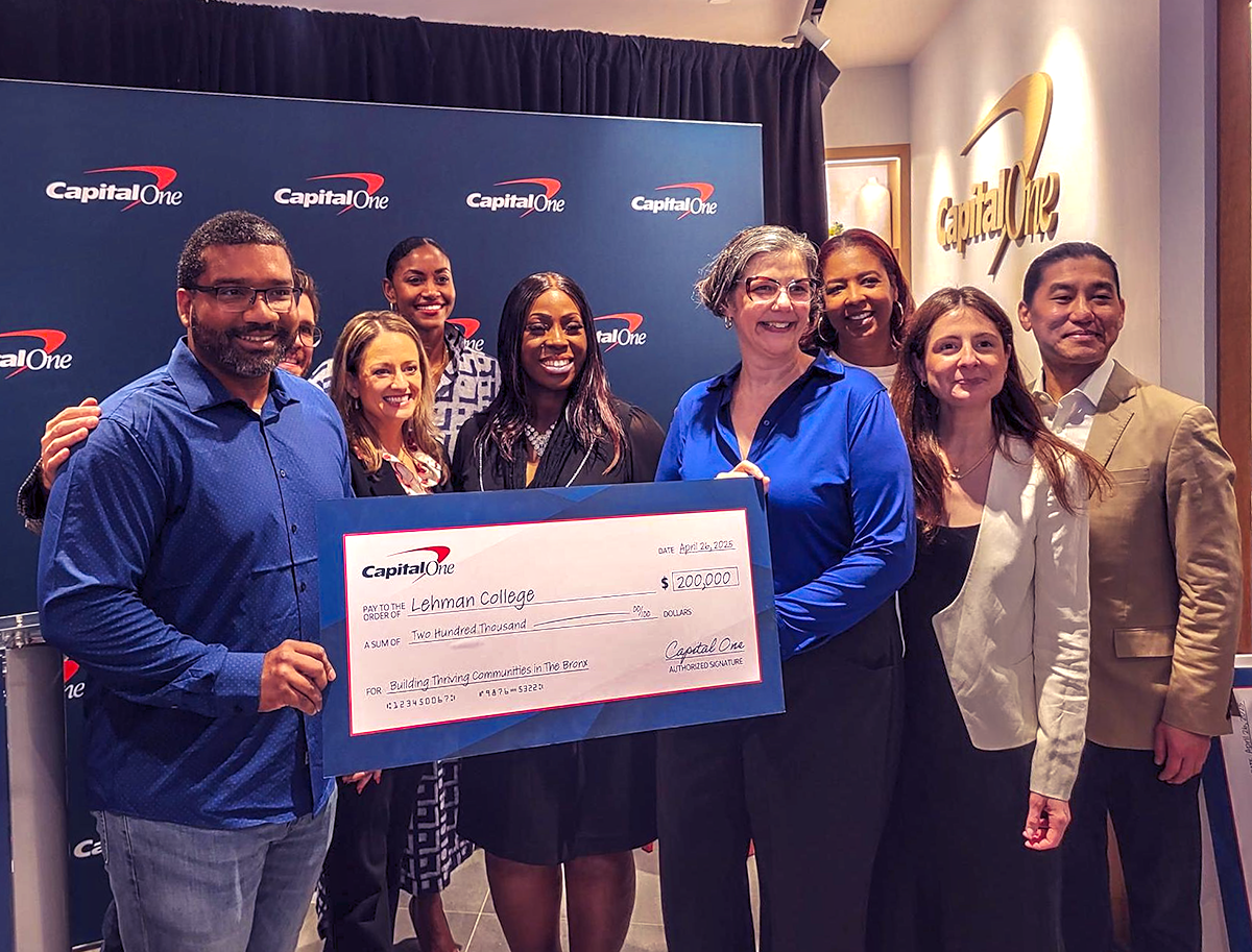 Lehman’s Bronx Business Tech Incubator leaders holding check presented to the college by Capitial One