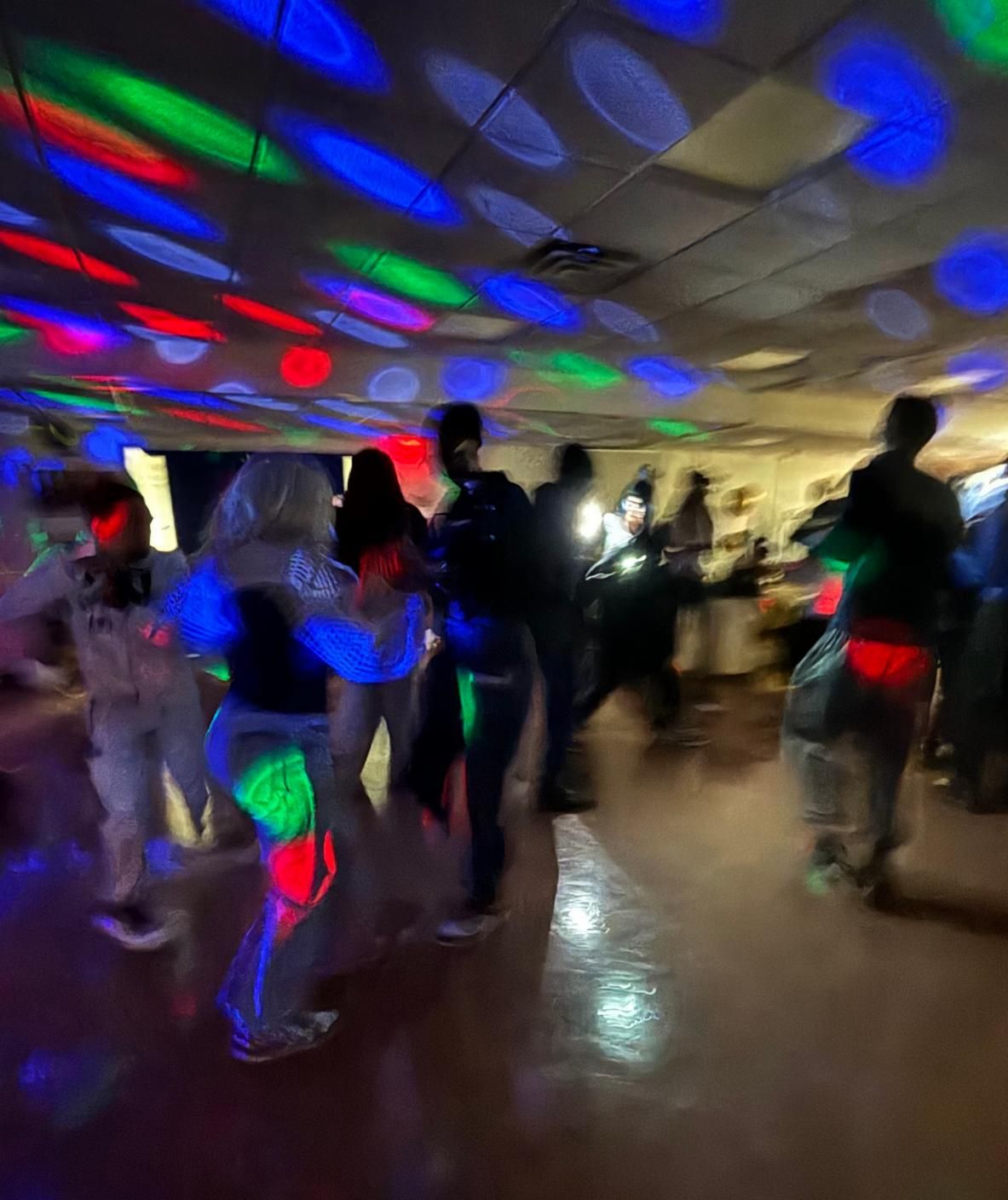 Funky lights and dancing - abstract photo