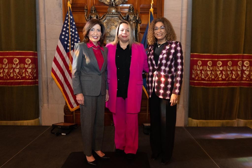Jasmin poses with Governor Hochul and Assemblymember Tapia