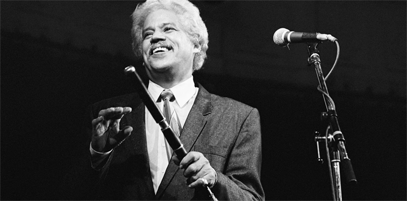 Black and White photo of Pacheco at Microphone