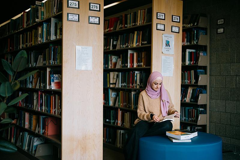 Quiet Space in Library with student reading