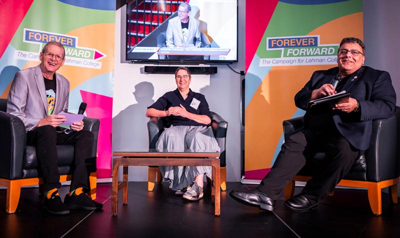 Alumnus Gary Axelbank with Associate Provost Karin Beck and President Fernando Delgado on stage)
