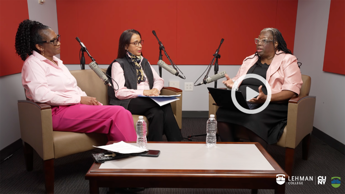 Professor Elgoria Harrison and two women sitting and talking