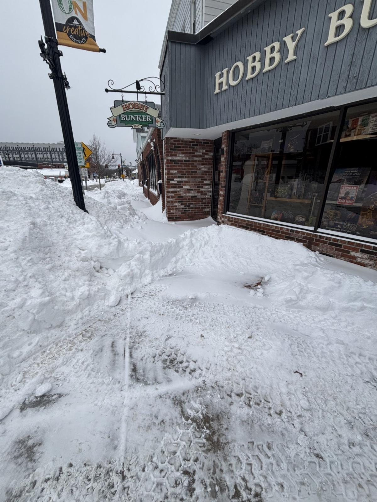 Hobby Bunker store front with snow outside