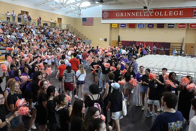 Large crowd of students being welcomed