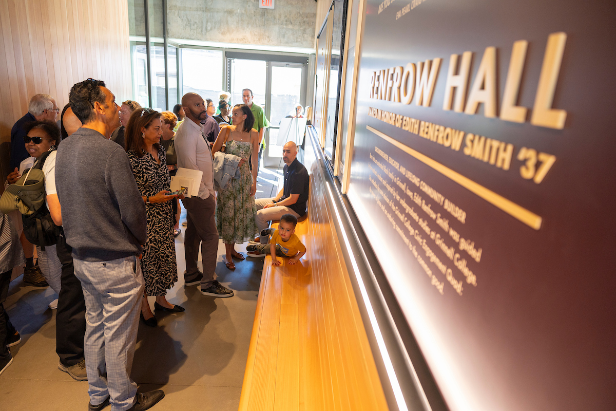Dedication attendees view the tribute to Mrs. Edith Renfrow Smith at Renfrow Hall.