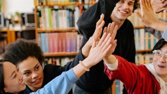 youth high fiving