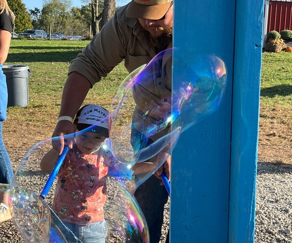 Photo of children playing at a recent Early Intervention event at Van Buren Acres.